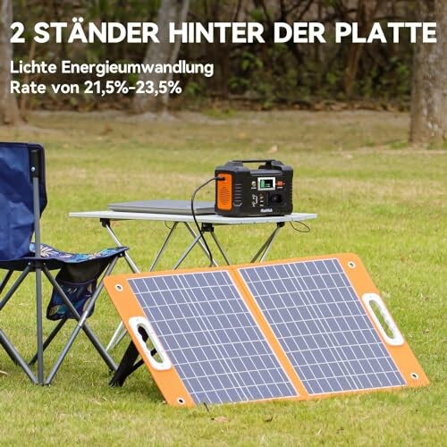 Tragbares Solarpanel und Energiestation beim Camping.